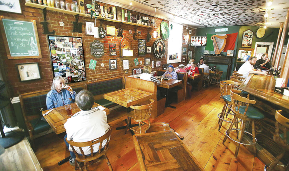 A group of customers enjoy a quiet lunch Wednesday inside the cozy space of Morrison’s Irish Pub at the foot of State Street in Alton near the Ardent Mills complex. The restaurant is one of almost two dozen particpating in Restaurant Week, which ends Sunday.