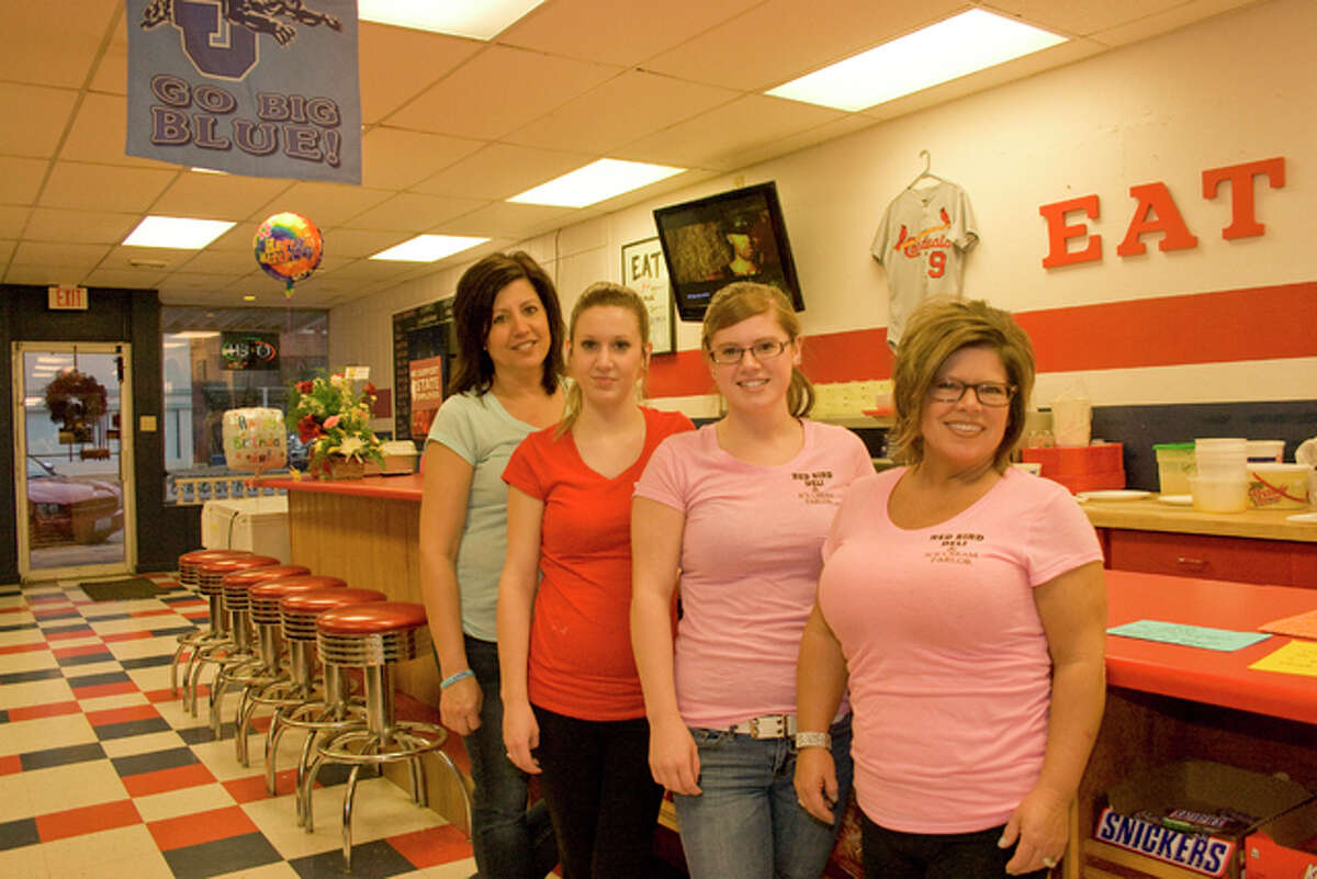 From right, Carla Murphy, daughters Emily and Rebecca Dotson, and Noncee Gotway manned the Red Bird Deli in Jerseyville last week, following the lunch rush. Mara Best and Phillip Wittman are also employed at the establishment, which continues to grow in popularity.