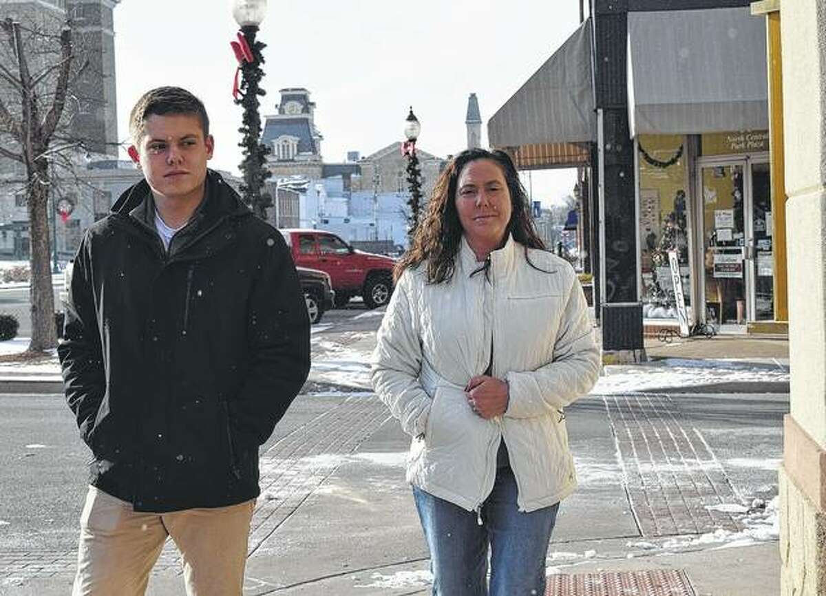 April and Luke Coop of Jacksonville hurry to get to their destination Tuesday as temperatures hover around 10 degrees.