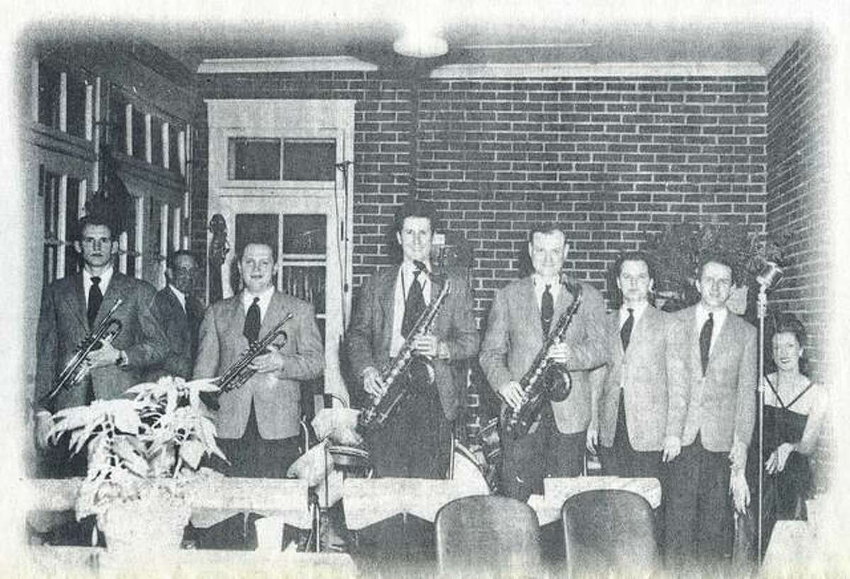 The Boots Brennan Orchestra takes a break from a performance on New Year’s Eve 1945 at the Jacksonville Country Club. Glen Hawks (from left), Maurice Johnson, Earl Rabjohns, Gillie Combs, Lettsom Reid, Sammy Turner, Boots Brennan and Billie Plank.