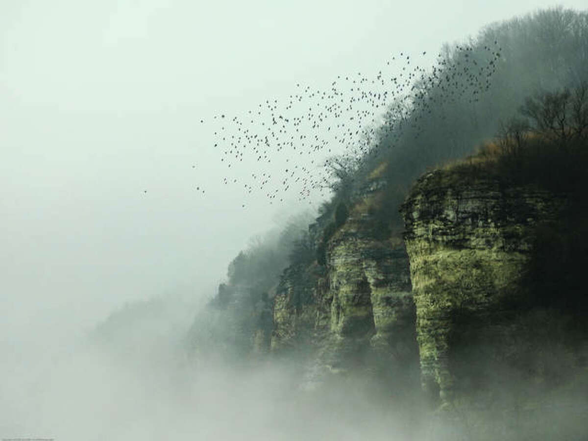 “Mississippi Mist Meets Elsah Bluff” by Marietta Massalone, the www.greatriverroad.com purchase prize winner in this year’s Elsah Photography Exhibit.