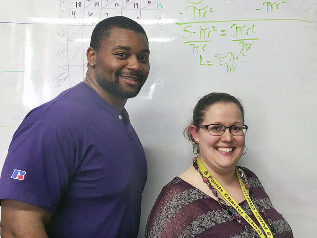Submitted photo Eight Points Charter School math teacher Beth Simler (right) has been nominated for Renaissance Learning’s Distinguished Teacher Award. Simler is assisted by Martez Turner.