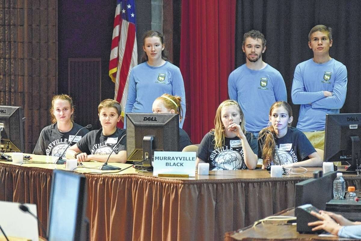 The Murrayville-Woodson Elementary School black team faces off against the Eisenhower Elementary School gold squad Wednesday night in the opening round of the Regional Geography Bowl. One hundred thirteen fifth- and sixth-graders from Jacksonville area schools participated. Photos of the first- and second-place teams will appear in Friday’s Journal-Courier.