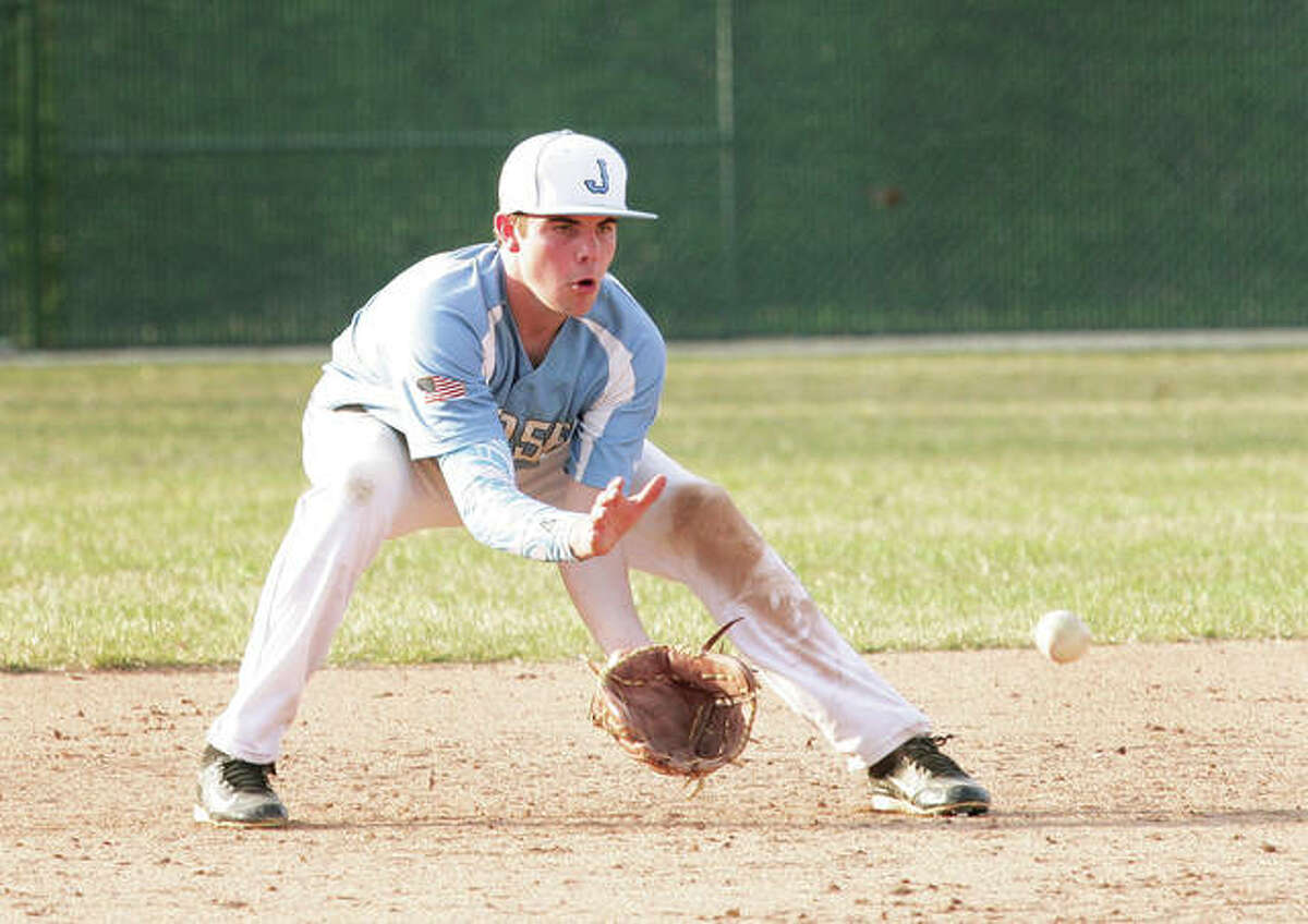 Jersey infielder Daniel Williams fields a groundball in a March 20 game against the Alton Redbirds in Godfrey. The Panthers were in Bethalto on Monday and fell remained winless in the Mississippi Valley Conference with a 10-0 loss to Civic Memorial.