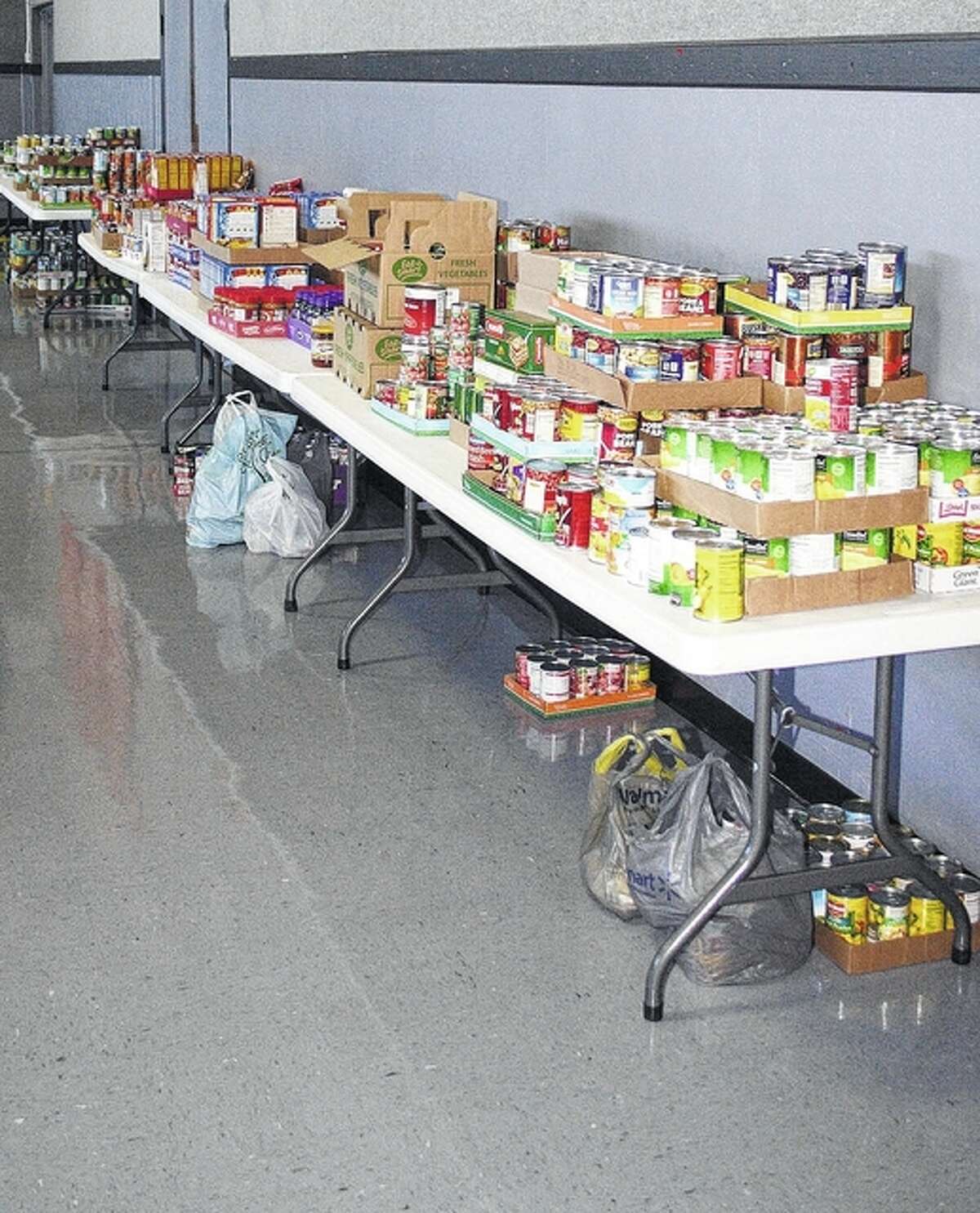 Courtesy of Greg Tabeek Row after row of canned goods sit waiting for distribution.
