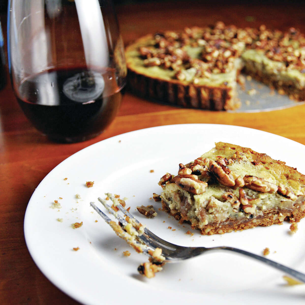 Pecan Maple Blue Cheese Bourbon Tart is sweet and savory, all rolled into one flavorful appetizer.