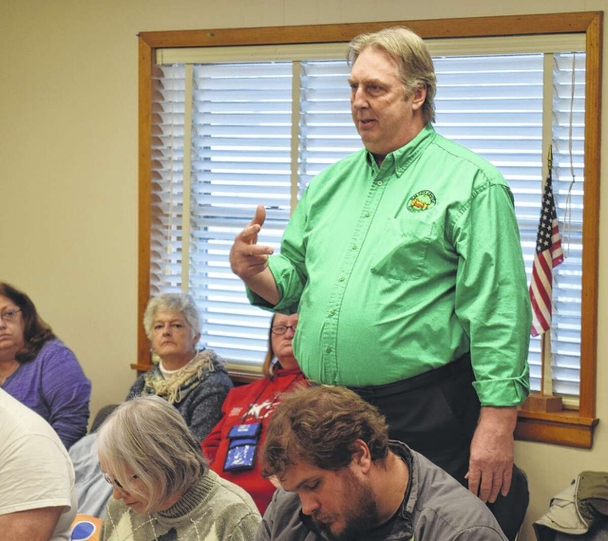 Tom Frederick, president of Elm City Center, answers audience questions Monday at the Jacksonville Area Center for Independent Living.