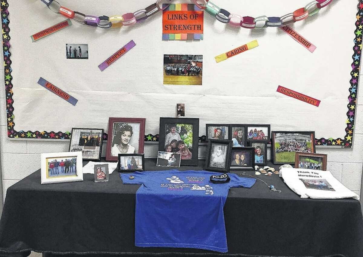 This is a Links of Strength display at Meredosia-Chambersburg Junior-Senior High School. The display features photos and other items that bring a sense of strength to students, faculty and staff at the school.