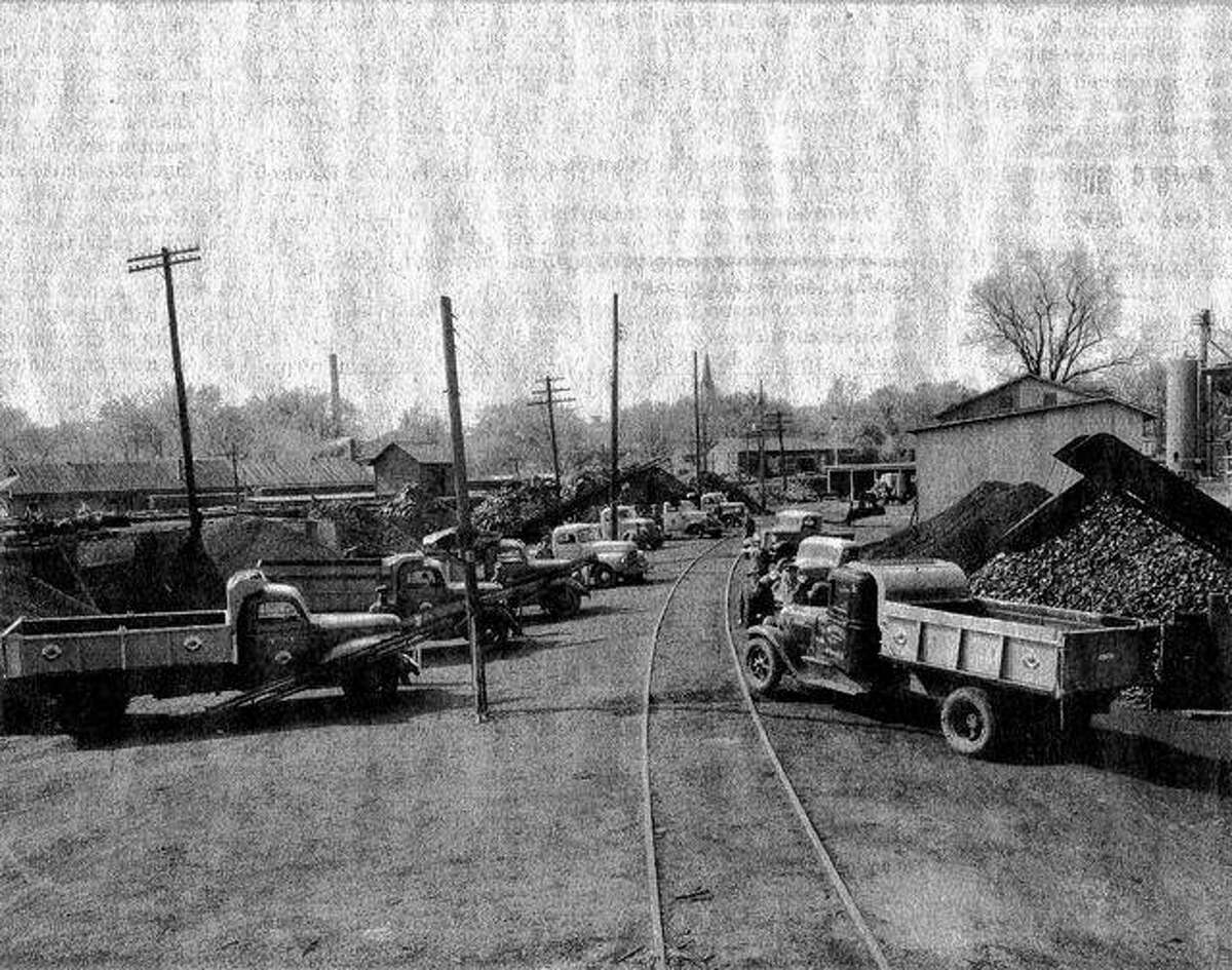 The Walton & Co. coal yard on East College Avenue in the early 1940s. The buildings on the right belonged to Wright Lumber Co.