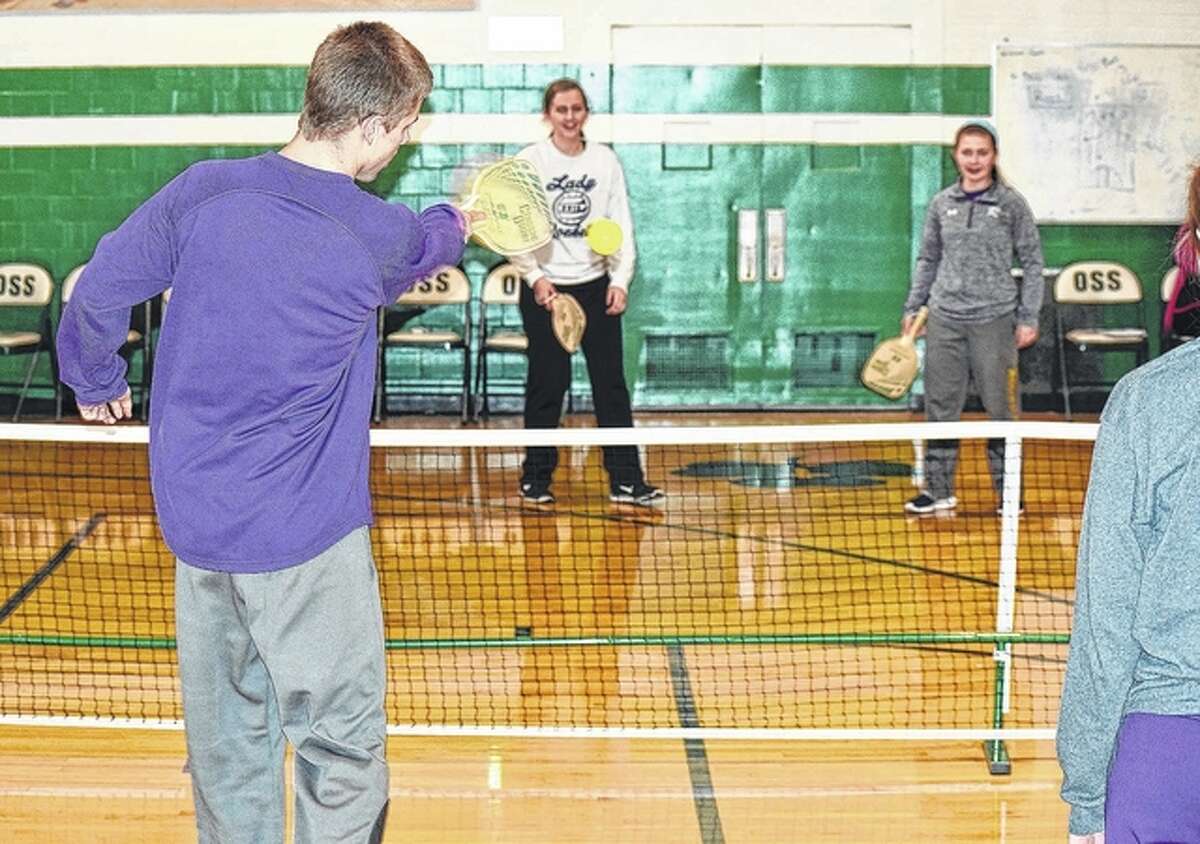 Routt High School and Our Savior School students pay a game of Pickleball for student appreciation day Thursday, part of Catholic School Week.