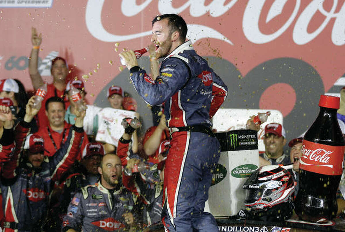 Austin Dillon celebrates in Victory Lane after winning the NASCAR Cup series race at Charlotte Motor Speedway in Concord, N.C., on Monday.