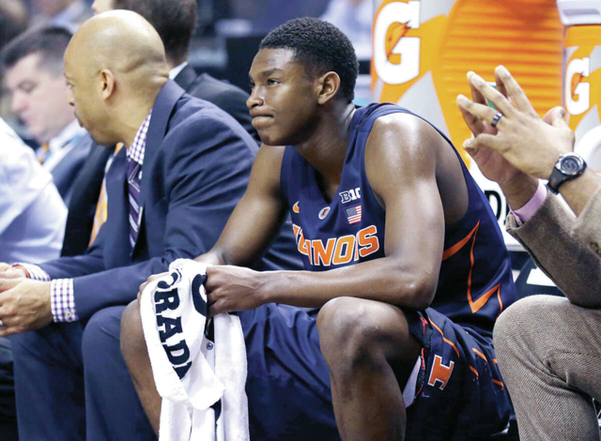 Illinois' Jalen Coleman-Lands (5) reacts on the bench during the second half of an NCAA college basketball game against the Purdue in the quarterfinals at the Big Ten Conference tournament, Friday, March 11, 2016, in Indianapolis. Purdue won 89-58. (AP Photo/Michael Conroy)