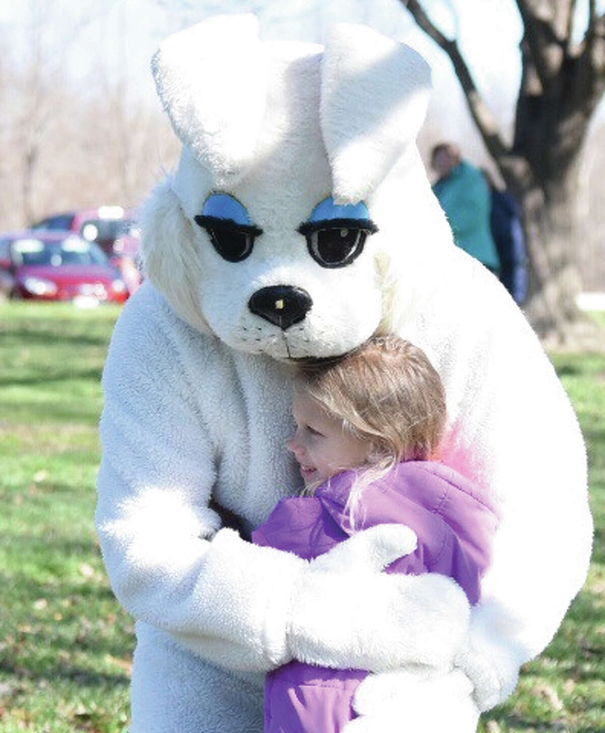 One Easter egg hunter on Saturday at Gordon F. Moore Park received a personal congratulations from the Easter bunny.