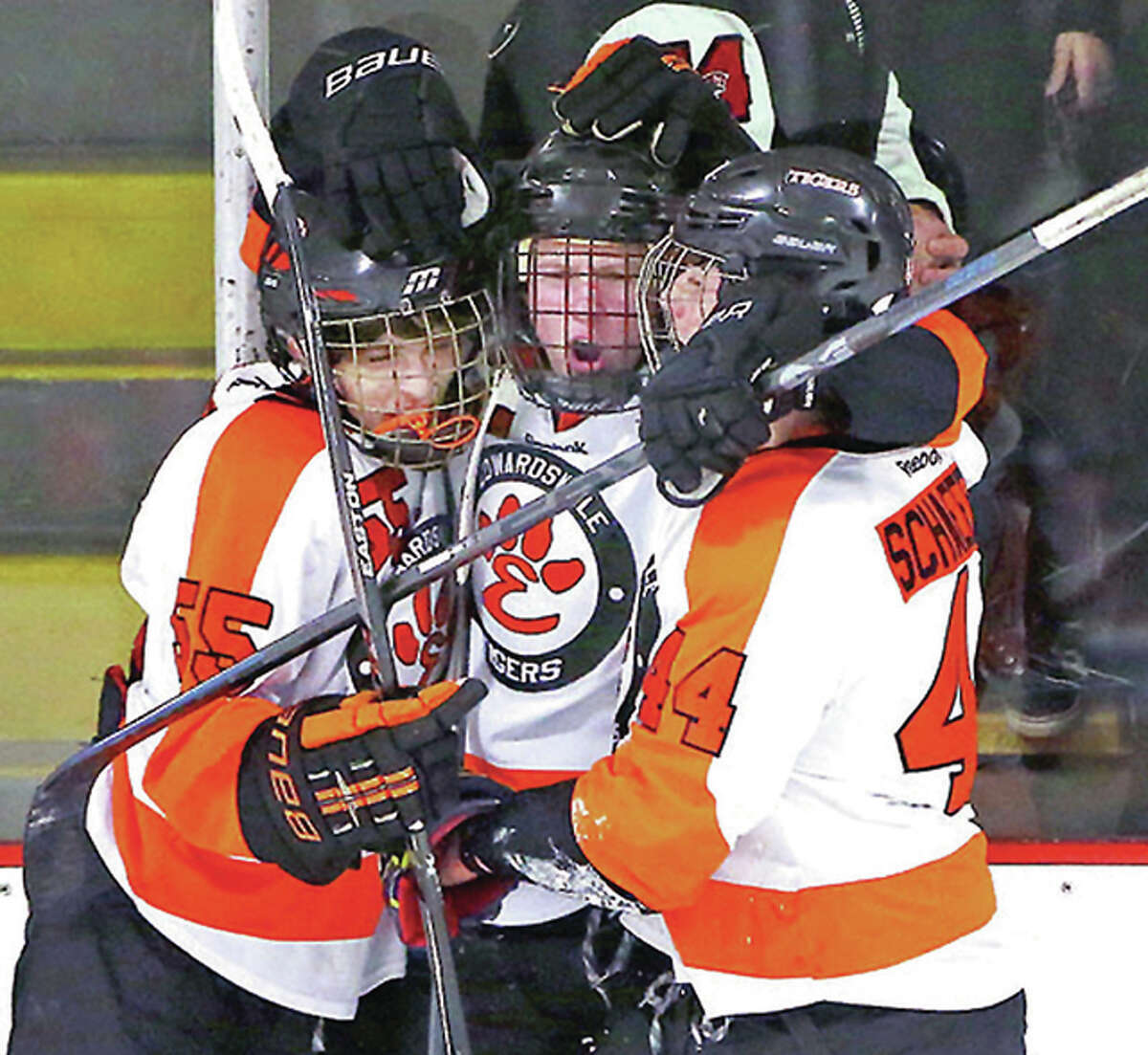 Edwardsville’s Tyler Hinterser, center, scored a goal early in the third period and then in the final minute in his team’s 4-2 loss to Brookings, South Dakota Sunday in the quarterfinals of the USA Hockey High School Nationals in Reston, Virginia.