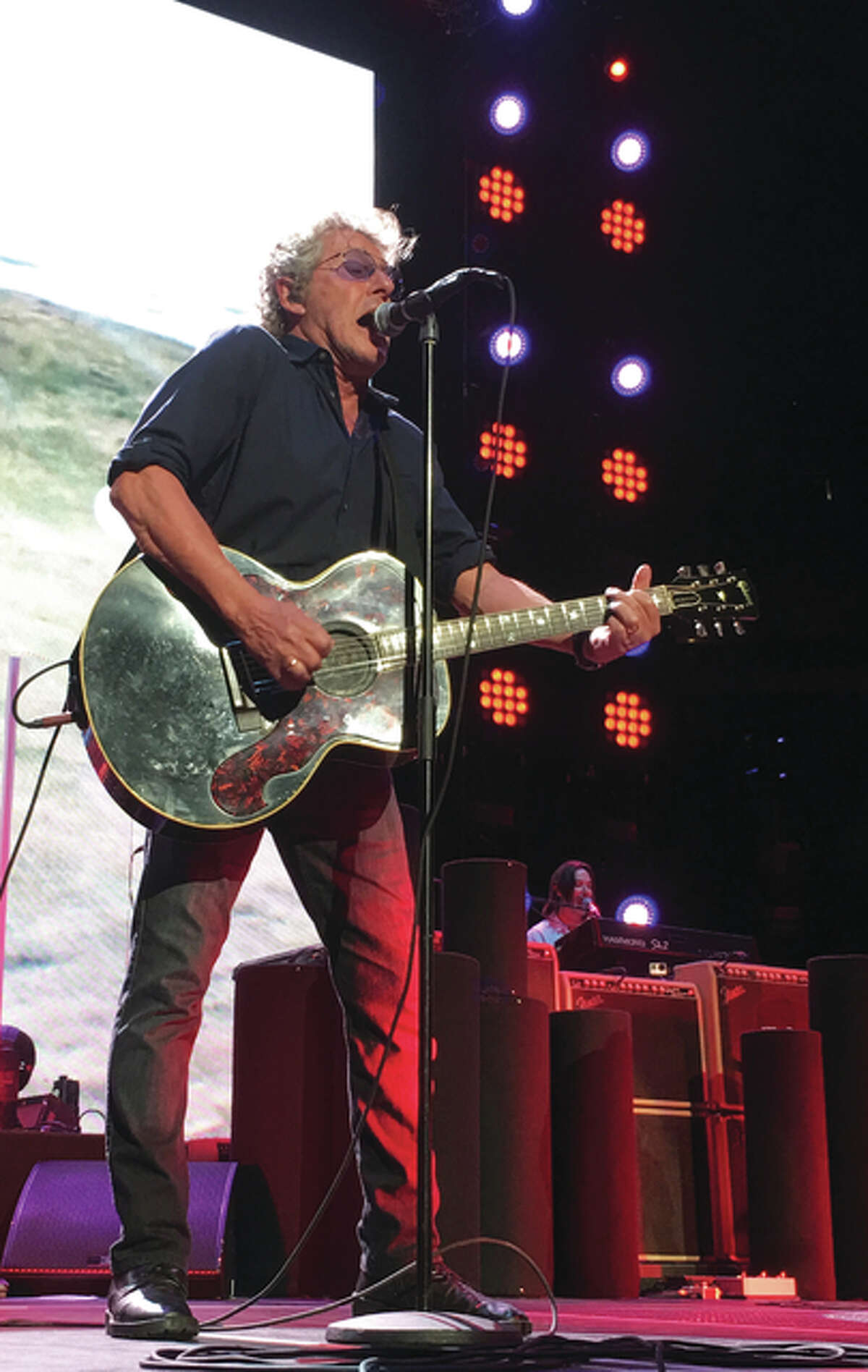 The Who opened its St. Louis show with “Who Are You” followed by “The Seeker” and "The Kids are Alright" Saturday night for The Who Hits 50! North American Tour’s rescheduled date at Scottrade Center. Lead singer Roger Daltrey, pictured, previously had vocal cord issues that caused postponement of two previous St. Louis dates. There were no signs of trouble Saturday night as Daltrey gave an outstanding performance and still hit the thrilling high notes on “Love Reign O’er Me” and “Won’t Get Fooled Again.” Jill Moon | The Telegraph