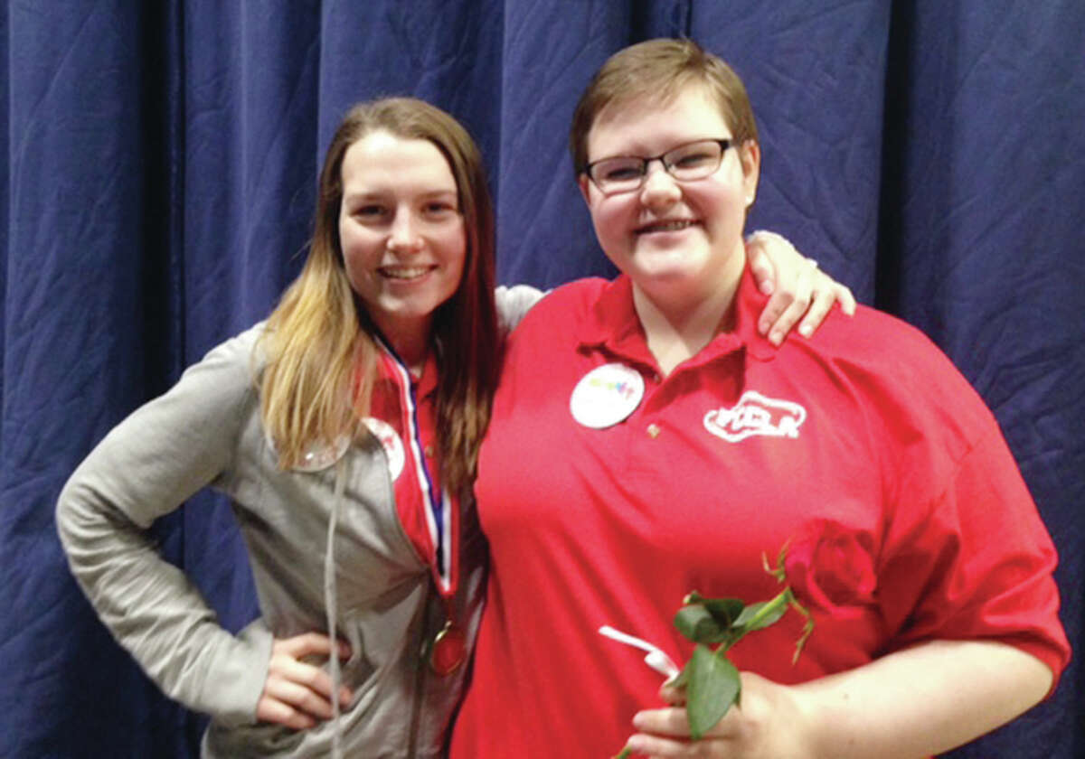Kaitlyn Zini, left, and Emma Ernst received gold medals at the recent FCCLA state convention in Springfield. Both will be competing in national competition in San Diego in July. A total of 13 Alton High School students attended the convention.