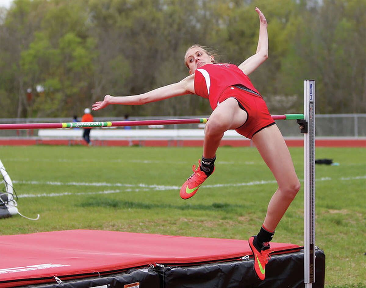 PREP GIRLS TRACK Alton's Mans sets high jump record