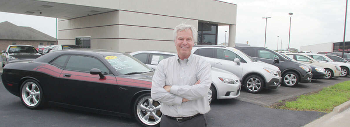 Dave Stevenson, co-owner of the newly-opened Quality Auto Network in Jerseyville, stands in front of some of the approximately 50 cars on the lot. The dealership, an expansion of Quality Buick GMC Cadillac in Alton, is located at 102 Sinclair Drive in Jerseyville, and sells pre-owned vehicles.
