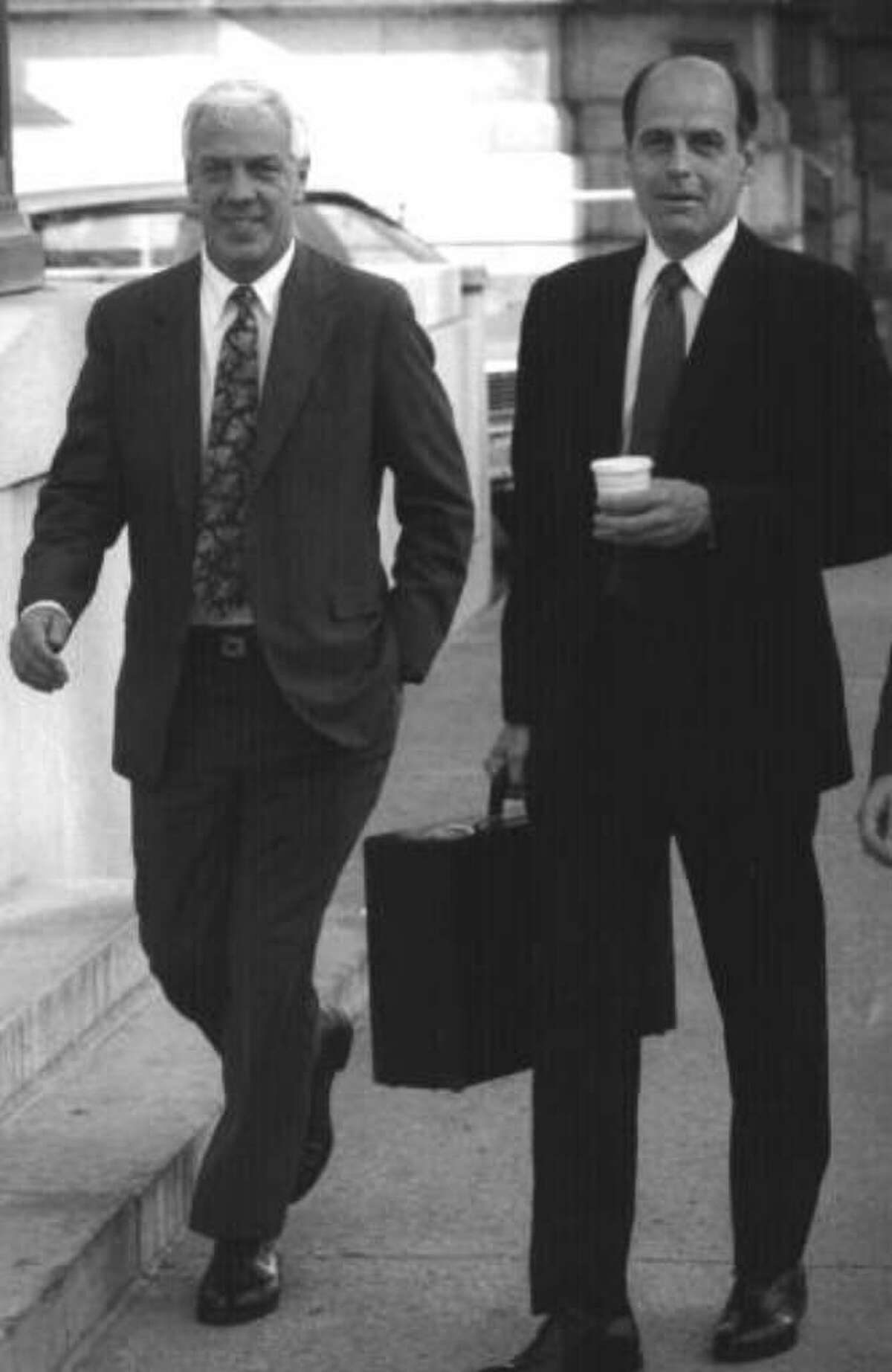 EX-ALBANY County Executive James J. Coyne, left, walks with his lawyer, Steve Coffey, in May 1992. Coyne was convicted. (Times Union archive)