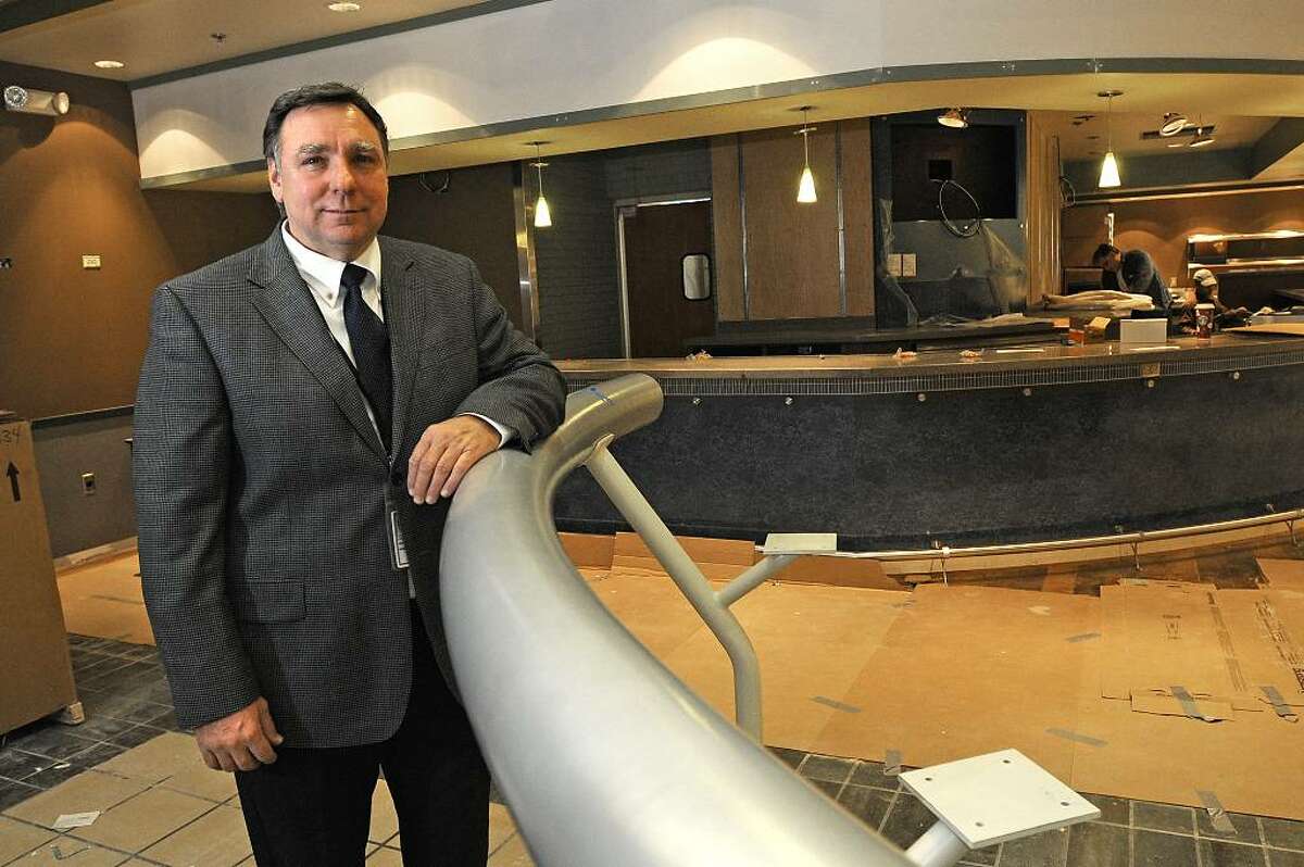 Bill Gibbons, General Manager of HMS Host, stands at the rail in the restaurant "Silks Saratoga Bistro" which is under construction at the Albany International Airport in Colonie, NY on November 9, 2009. For Anderson story about new restaurants going into the airport. (Lori Van Buren / Times Union)