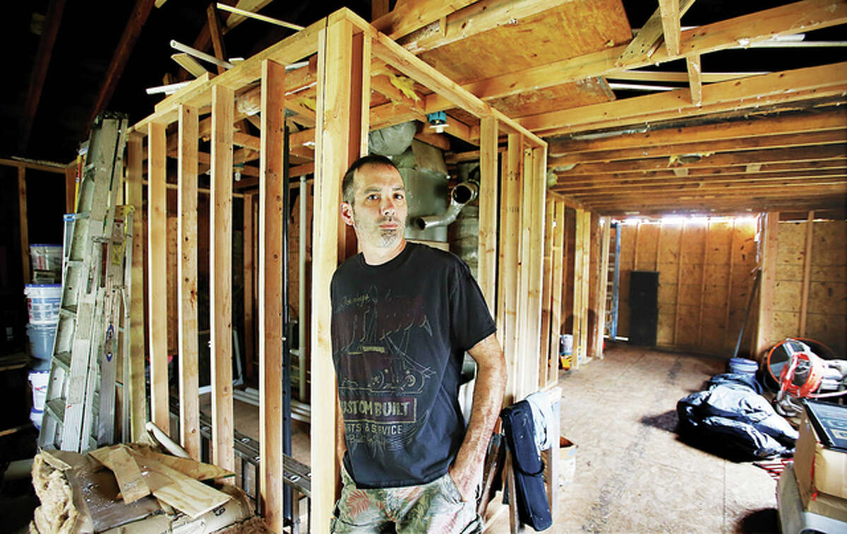 Bethalto man claims building official’s instruction cost him 18K