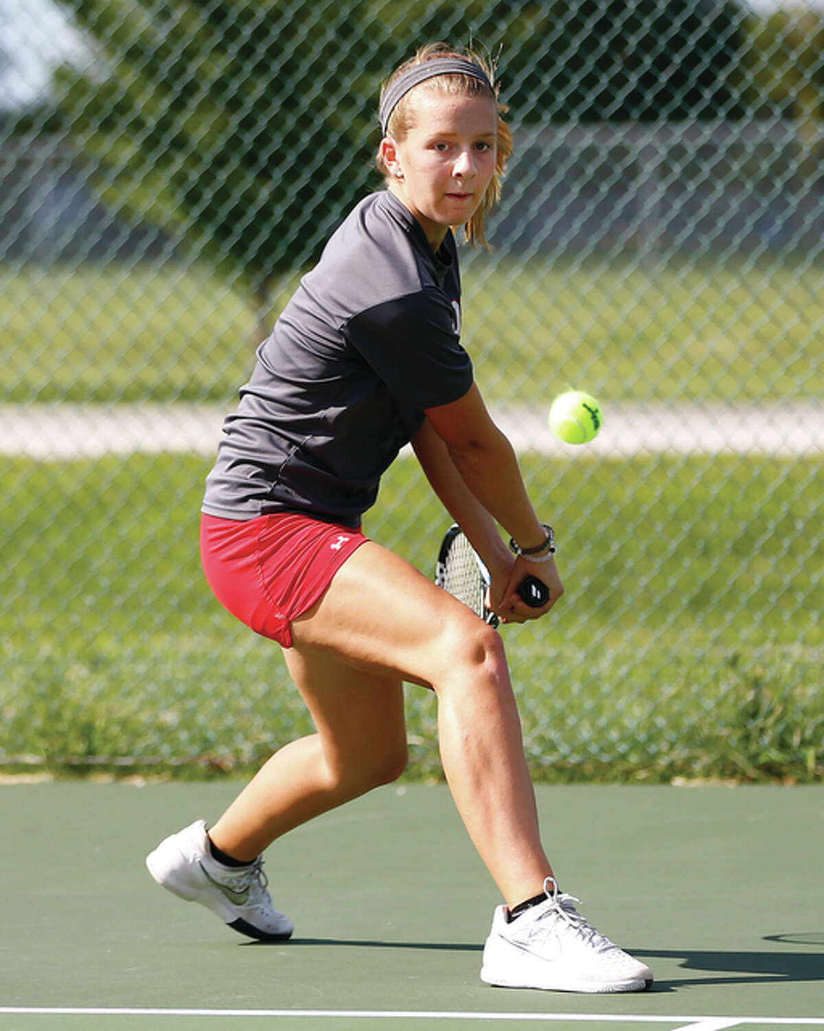 Alton’s Abby Fischer was a double winner in girls tennis action Thursday at Granite City. She won her singles match andthen teamed with Hannah Macias for a doubles victory.