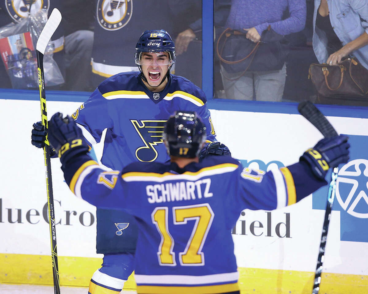Blues rookie center Robby Fabbri (back) celebrates his first NHL goal with teammate Jaden Schwartz (17) during the third period of the Blues 3-1 win over the Edmonton Oilers on Thursday night in St. Louis.