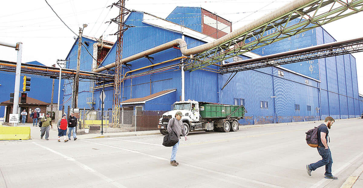 Workers leave the United States Steel Granite City Works in a file photo taken earlier this year. The problems encountered in Granite City are apparently being felt in steel plants across the nation as steel plants grapple for a way to compete in the world market.