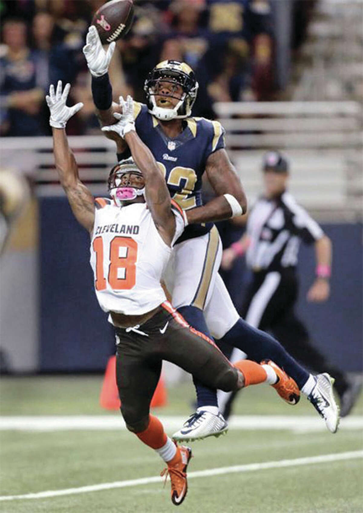 Rams cornerback Trumaine Johnson goes up to break up a pass intended for Brown wide receiver Taylor Gabriel (18) on Sunday in St. Louis.