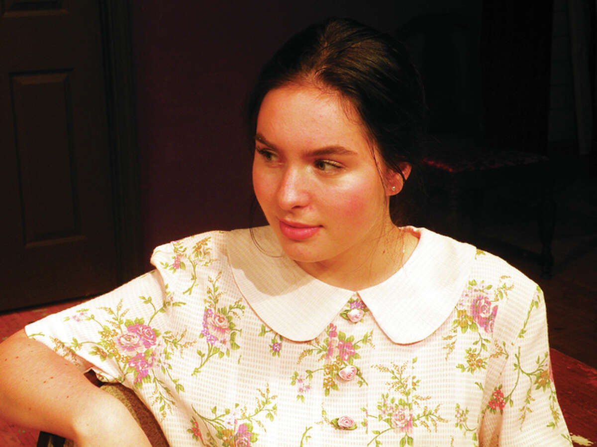 Cate Hamilton in Marquette Catholic High School’s upcoming Agatha Christie play, “A Murder is Announced.”