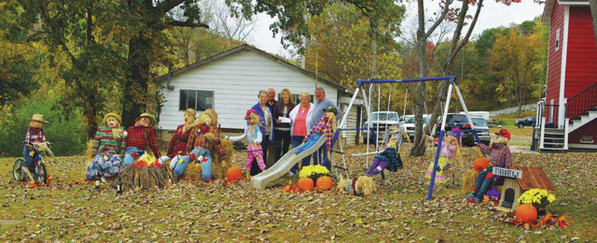 (photo 2) Best Scarecrow Display first place, River View Guest House — from left to right Amburg, Thompson, Brendel, Harmon and River View Guest House owner Bill Brendel.