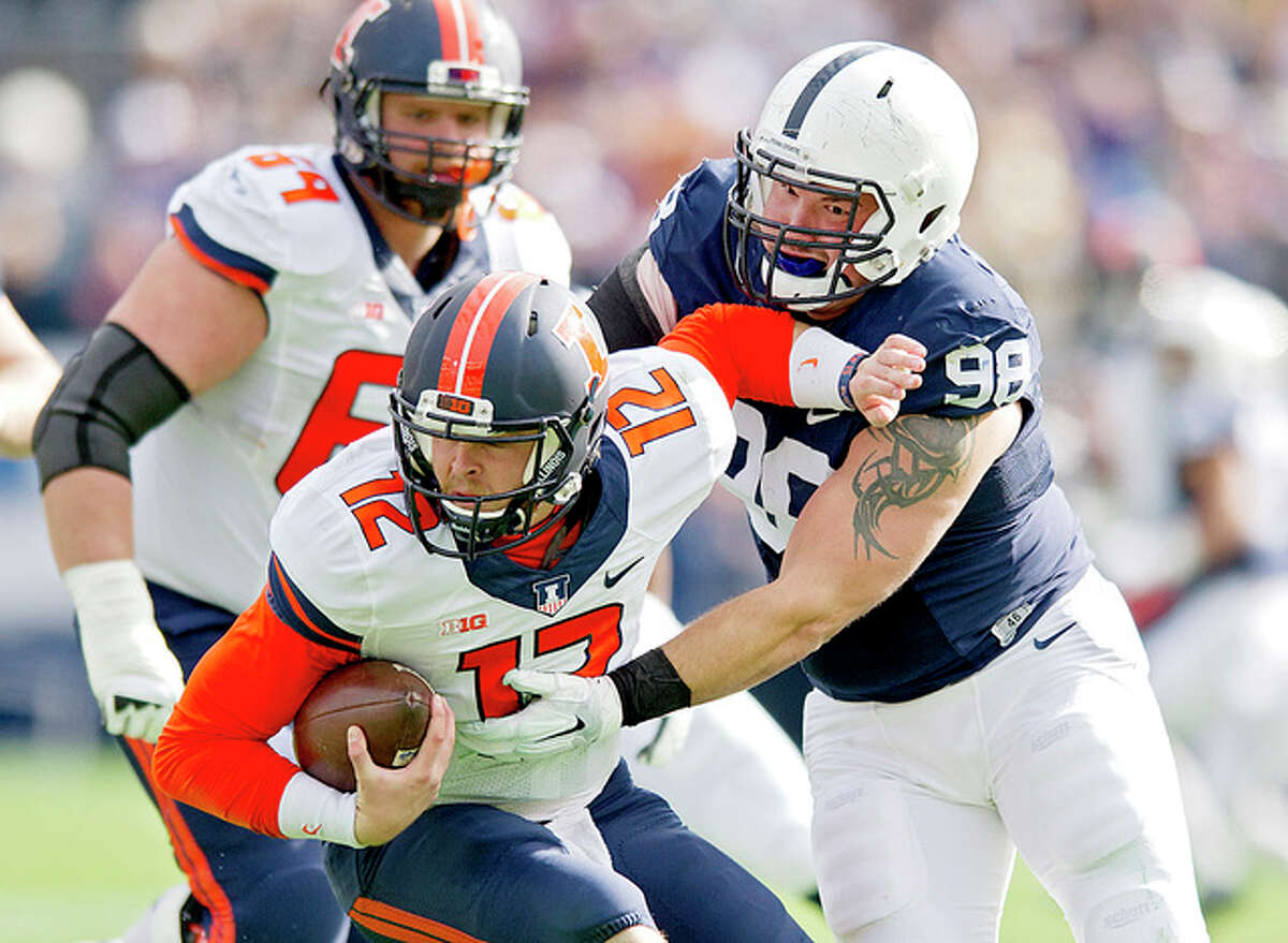 Penn State defensive tackle Anthony Zettel sacks Illinois quarterback Wes Lunt Saturday in State College, Pa.
