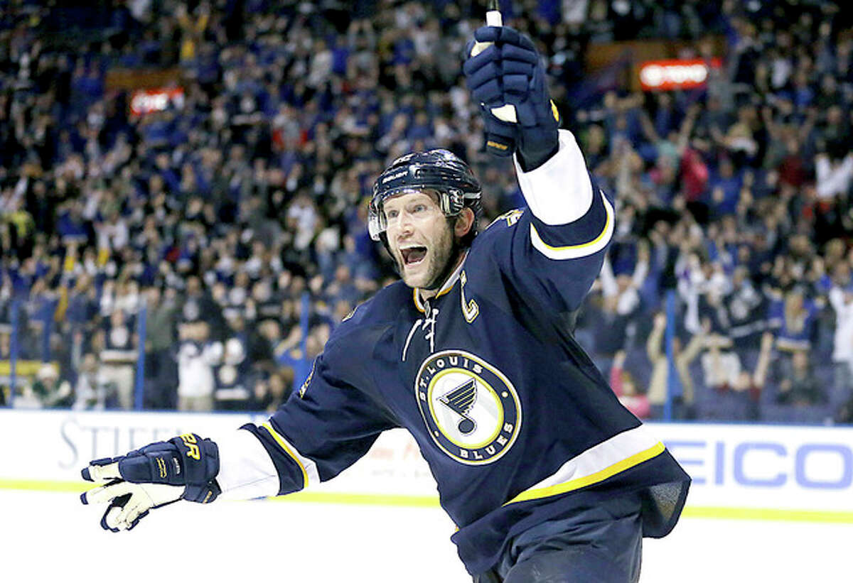 The Blues’ David Backes celebrates after scoring the winning goal in overtime against the Minnesota Wild Saturdayin St. Louis.