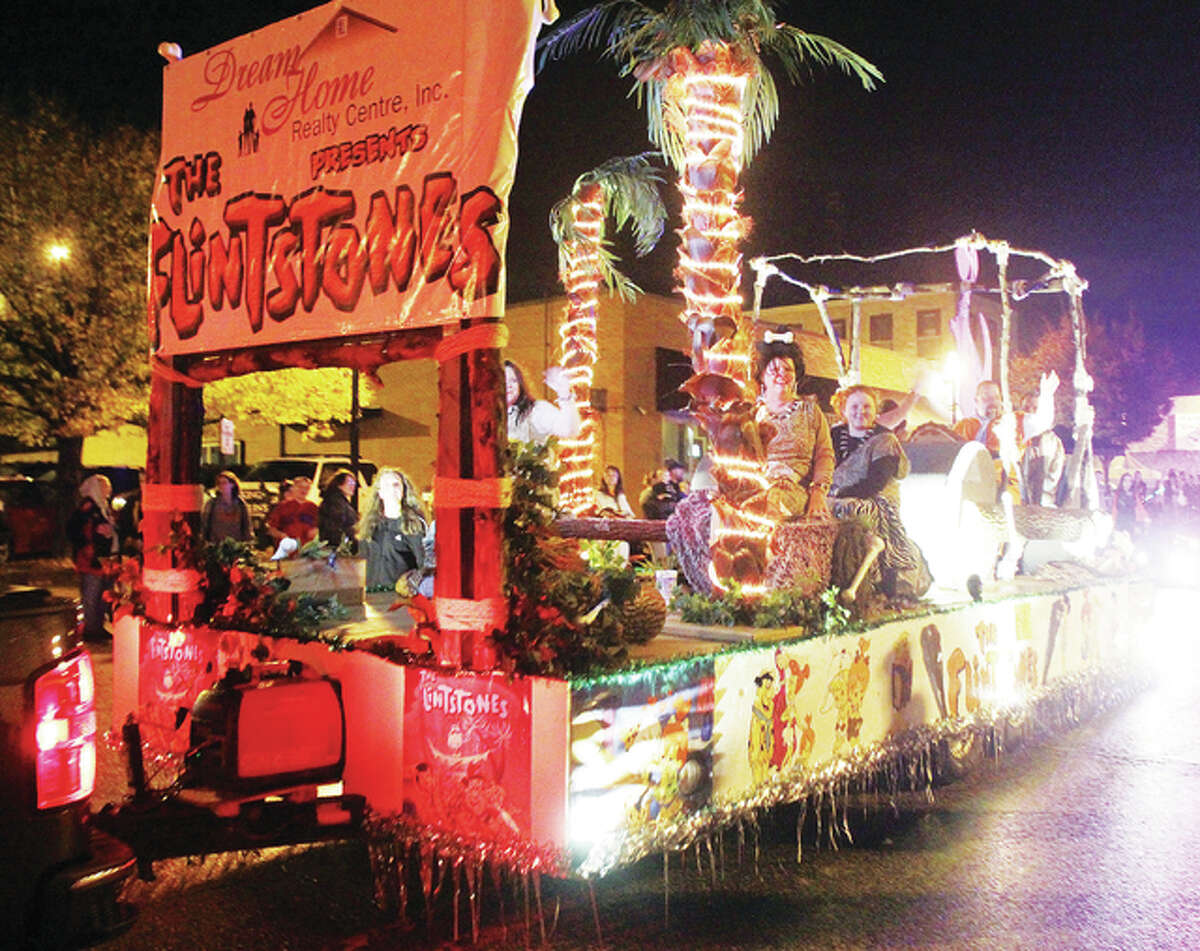 Dream Home Realty Centre Inc. presented The Flintstones float, winning first place in the 99th annual Alton Halloween Parade float contest’s commercial category. The category typically has the most entries. This year featured about 13-15 entries.
