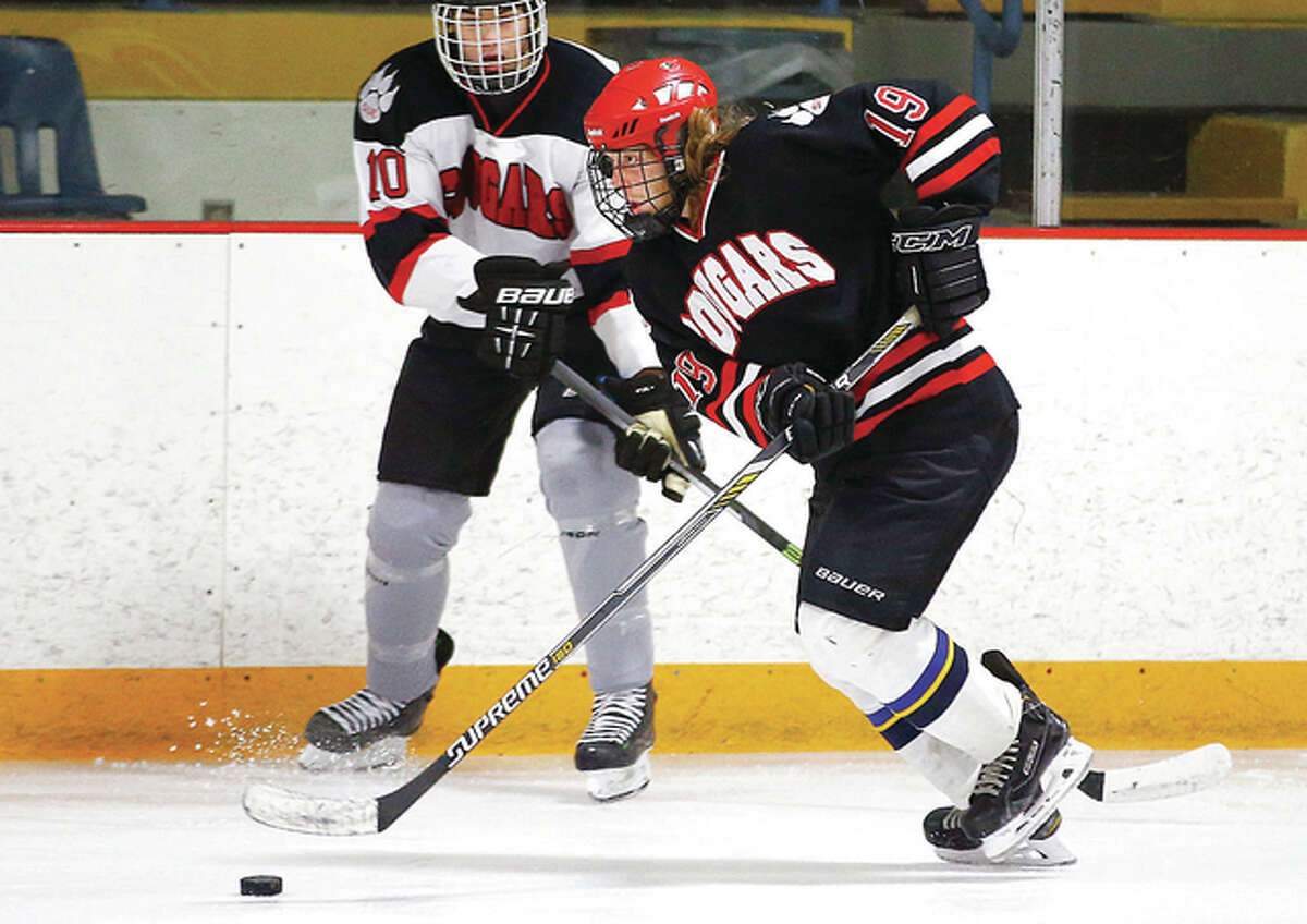 Former Alton Redbird Kain Henson (19) is one of six freshman on the SIU Edwardsville hockey team this season. The Cougars will host Northern Illinois University at 7 p.m. Friday and 3 p.m. Saturday at the east Alton Ice Arena.