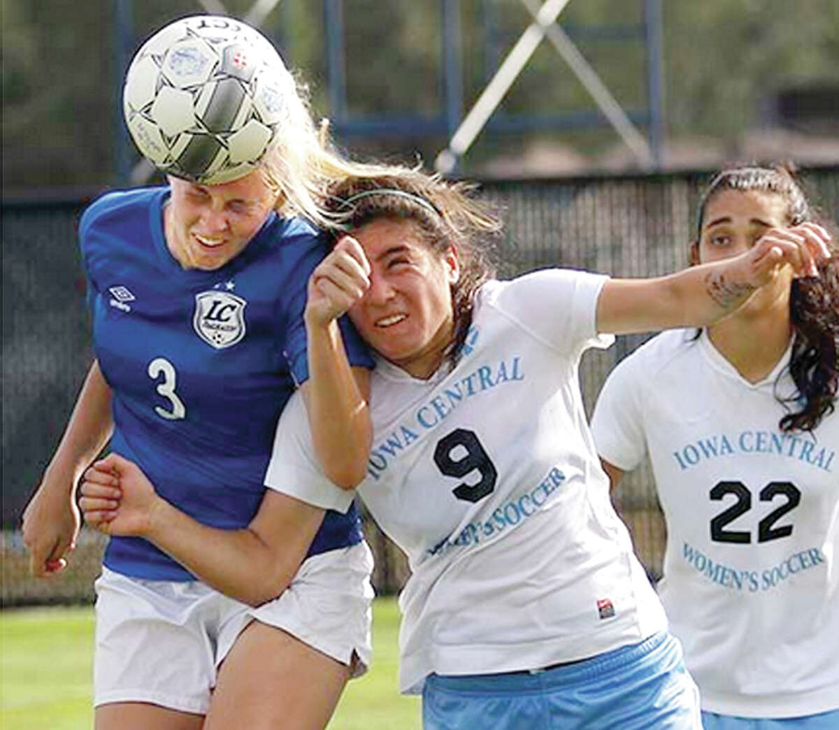 Lewis and Clark’s Nicole Howard (3) heads the ball away from Iowa Central’s Lucero Robayo (9) and Marillia Lages (22) in Wednesday’s pool play game at the NJCAA women’s National soccer Tournament in Melbourne, Fla.