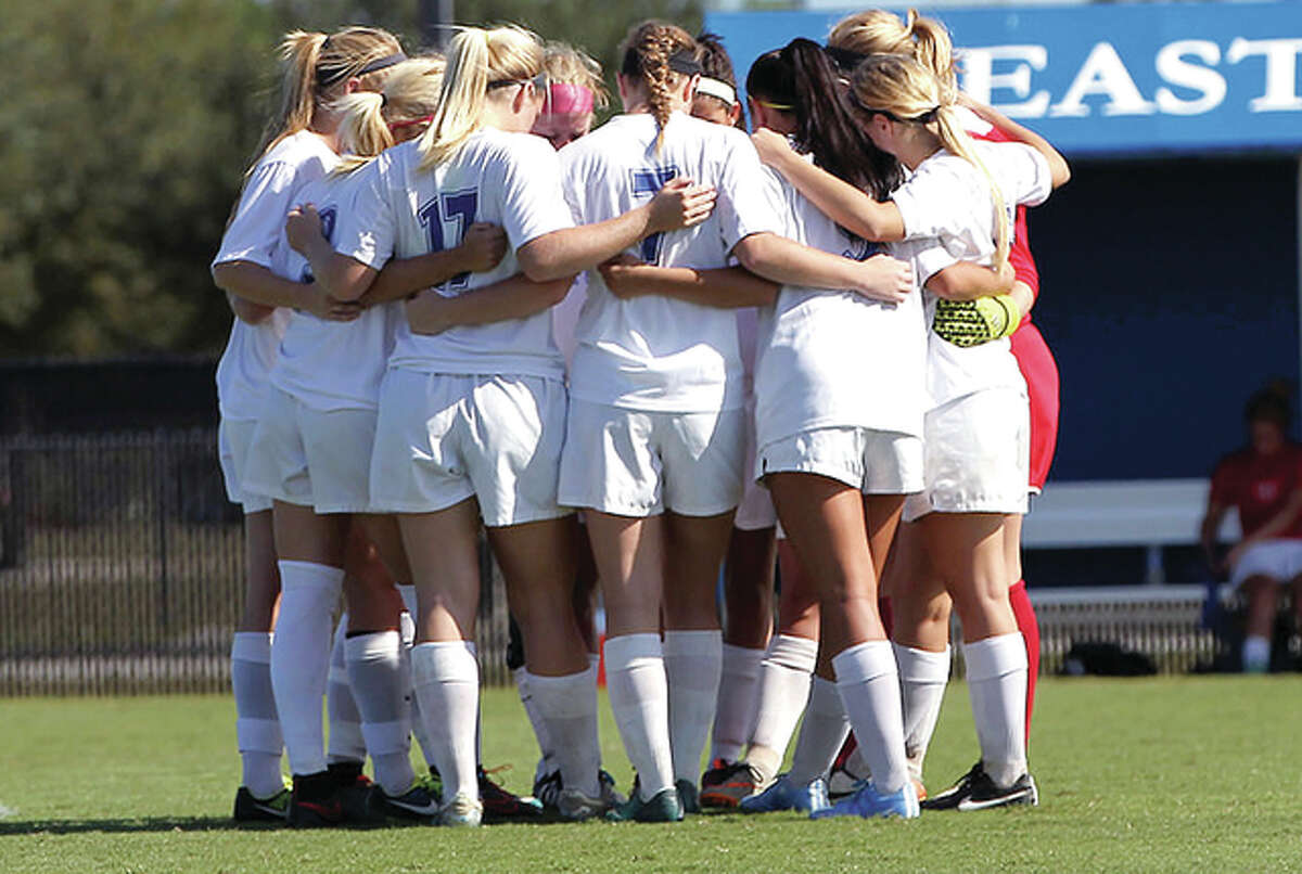 The Lewis and Clark women’s soccer team huddles up during the NJCAA Women’s National Soccer Tournament in Melbourne, Florida.