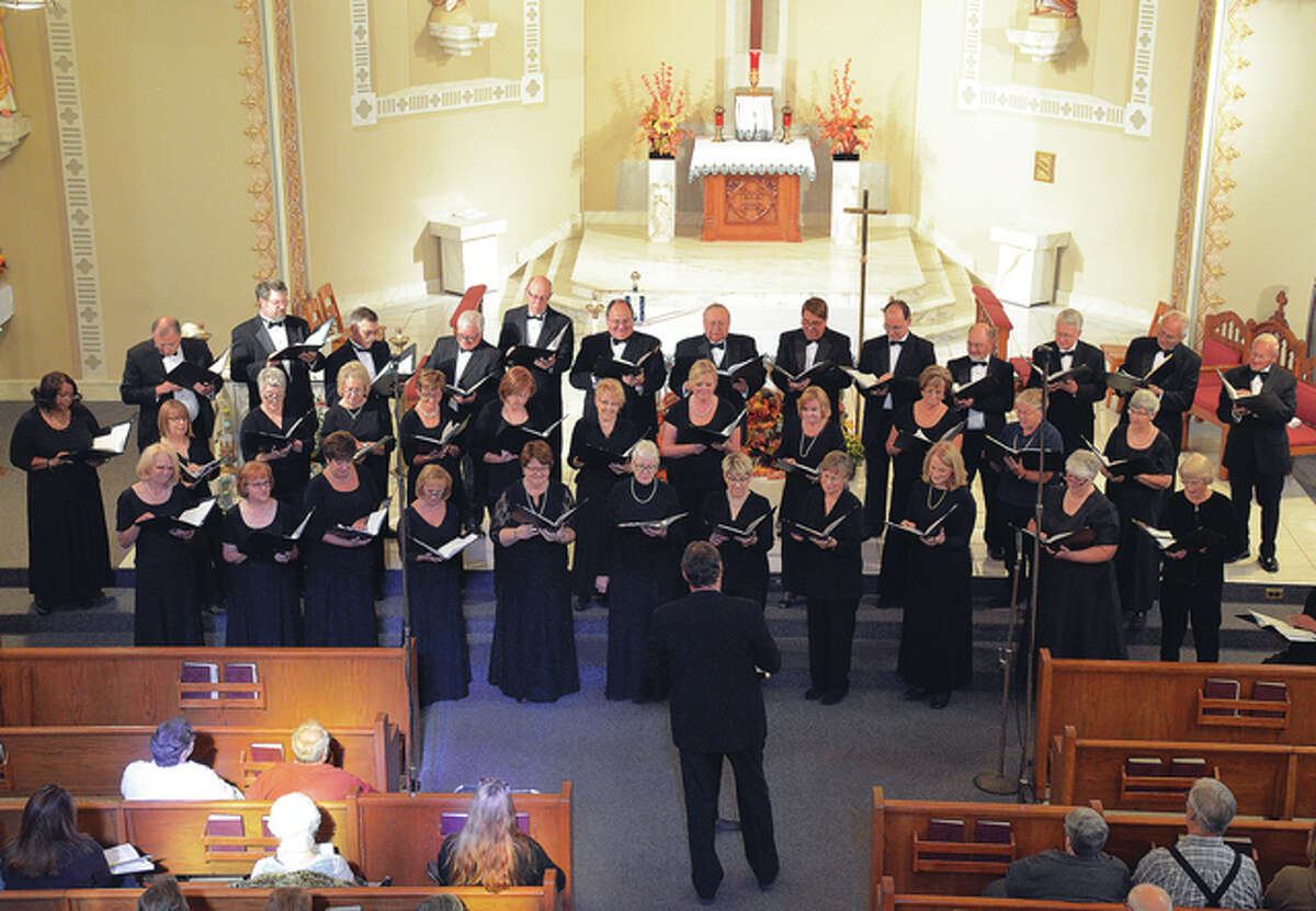 Ron Abraham directs the Great Rivers Choral Society during a previous Christmas concert. PHOTOGBUDDIES | For The Telegraph
