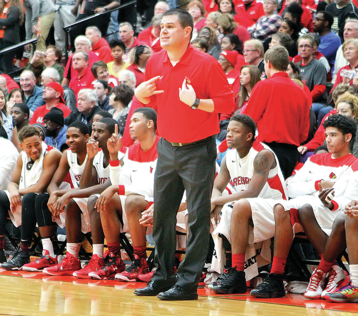 Alton coach Eric Smith’s Redbirds rolled up 50 points in the first half Tuesday night and cruised to a 73-58 victory over O’Fallon at AHS. The Redbirds are 4-1 on the season and 2-0 in the Southwestern Conference.