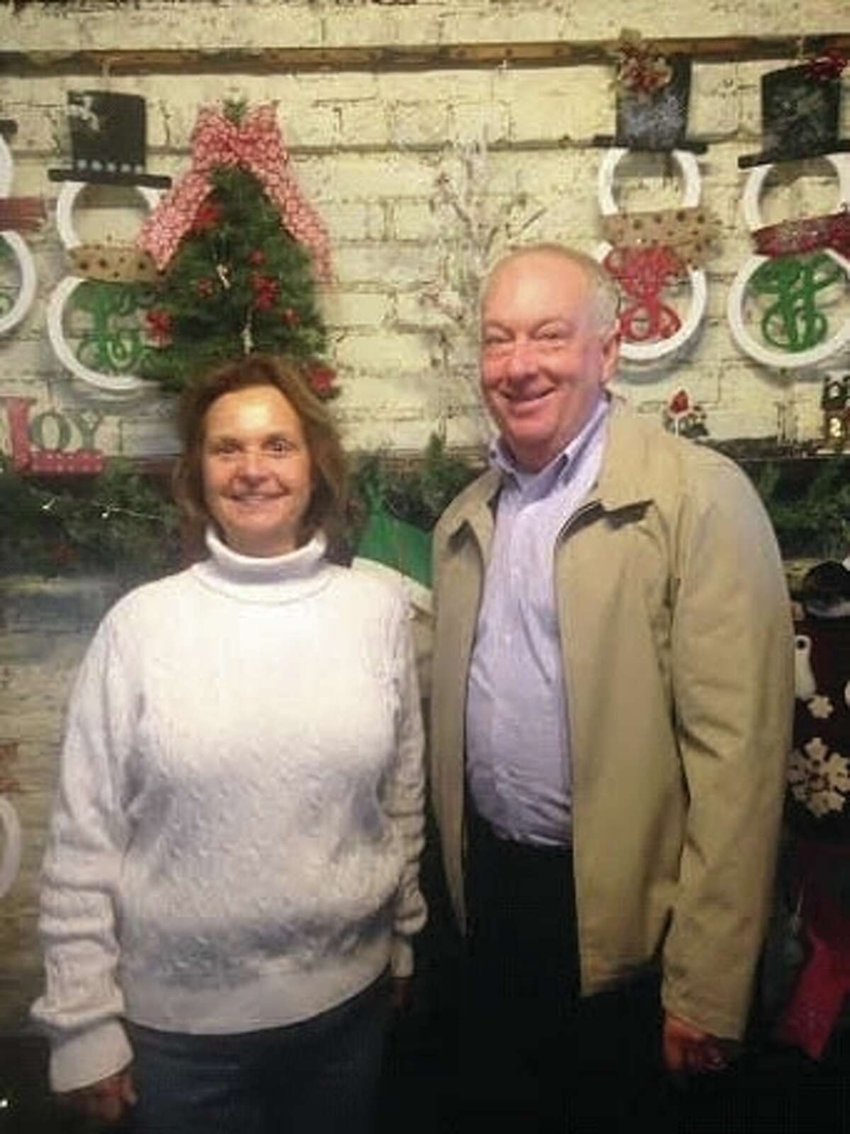 State Rep. Dan Beiser poses with the owner of 1904 General Store, Christine Velloff.