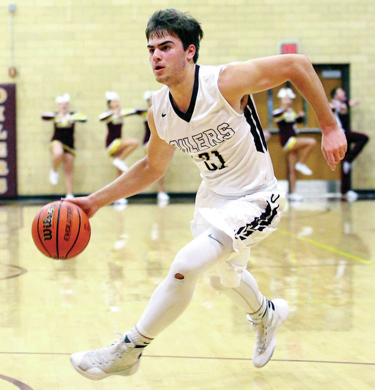 East Alton-Wood River’s Blake Marks scored 23 points in his team’s victory over Brussels and joined his school’s 1,000-point career scoring club Wednesday night at Memorial Gym.