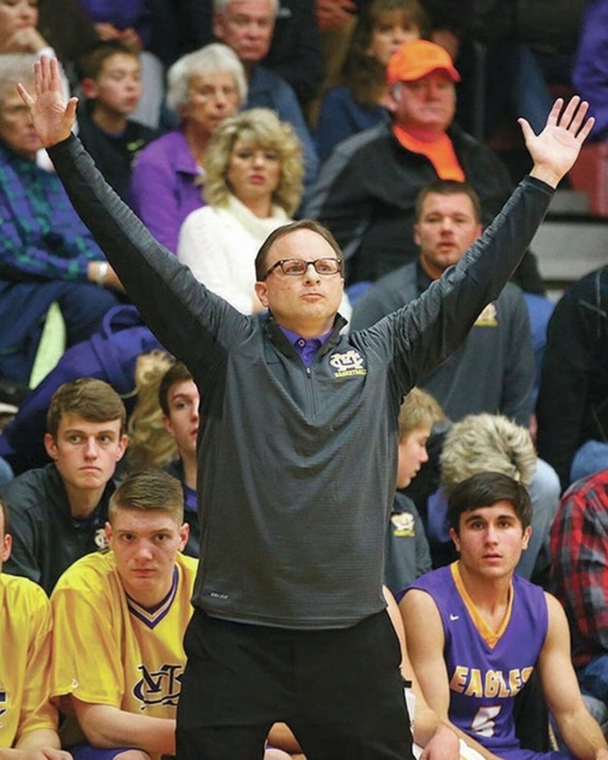Civic Memorial head coach Doug Carey reacts during Friday night’s game against the Shells in Roxana.