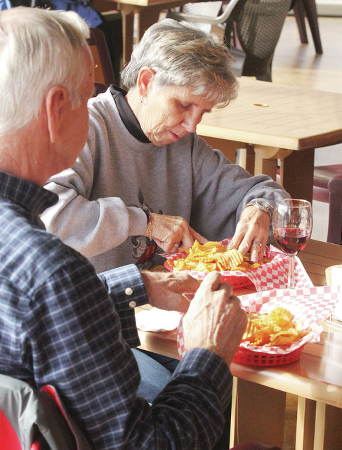 Lynne Well, right,and her husband Robert Well, of Godfrey, eat lunch Saturday at the Grafton Winery and Brewhaus. The restaurant is participating in Restaurant Week, a promotion of 19 local restaurants by the Greater Alton Regional Convention and Visitors Bureau.