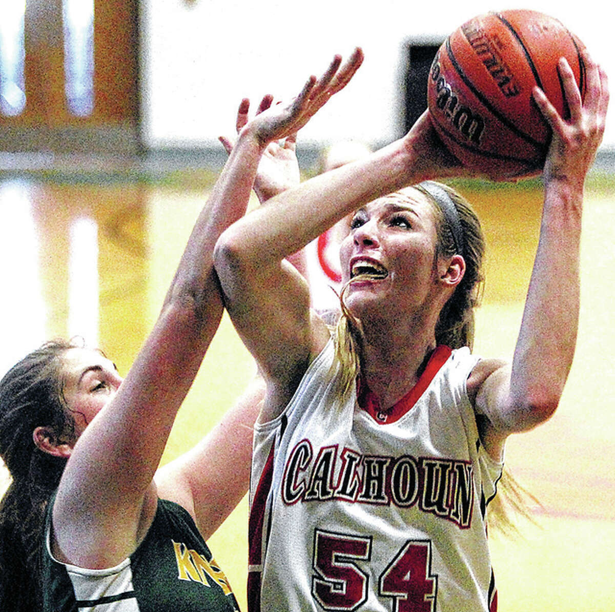 Calhoun’s Grace Baalman puts up a shot during a game against Metro-East Lutheran in the first round of the Carrollton Lady Hawk Invitational Saturday.