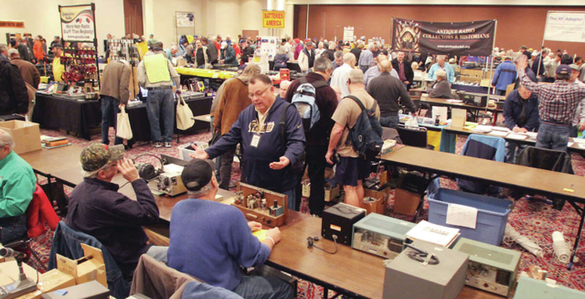 People browse and talk at Winterfest radio swap meet. About 800 ham radio operators and enthusiasts attended the event, held at Gateway Center in Collinsville.