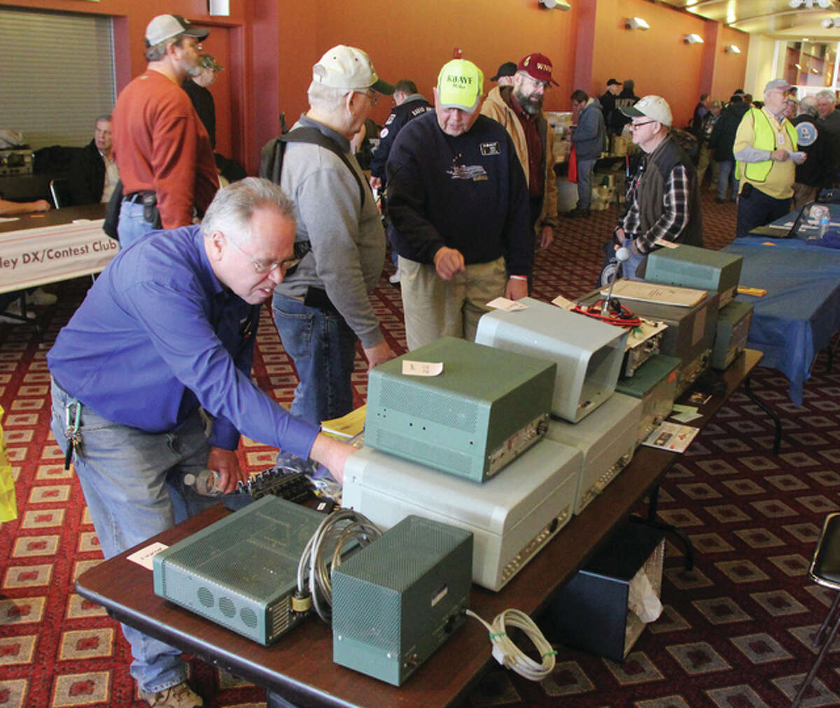Ham radio enthusiasts look over old and new equipment, or talk at Winterfest, an annual meeting, swap meet and sale for ham radio operators and enthusiasts by the St. Louis and Suburban Radio Club. About 800 attended the event, held at Gateway Center in Collinsville.