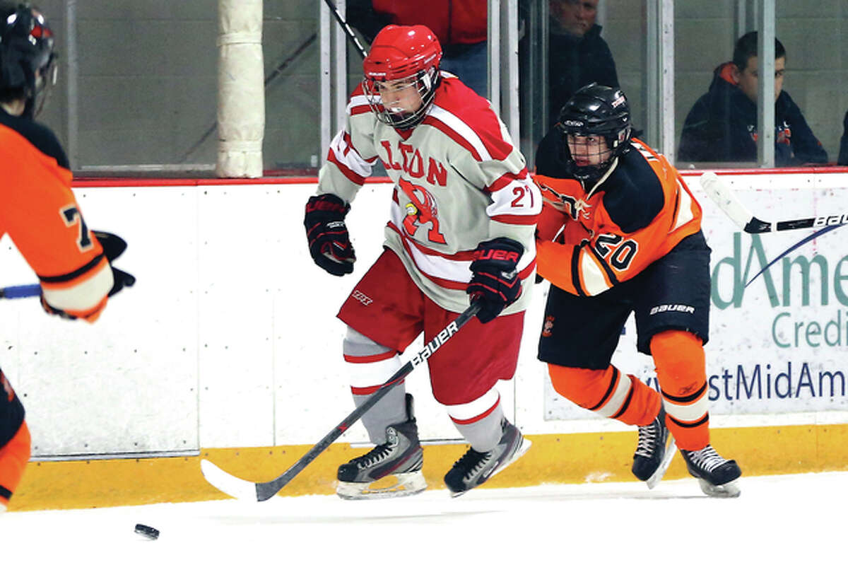 Scotty Waldrup, shown in action earlier this season, scored a pair of goals in Thursday night’s 10-3 victory over Highland at the East Alton Ice Arena.
