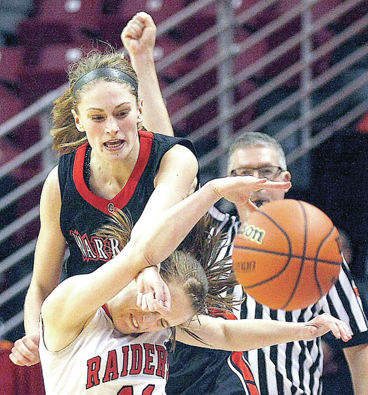 Calhoun’s Emma Baalman gets tangled with Central A&M’s Ryan Dooley in last season’s Class 1A state final. Baalman and her teammates will begin the quest of trying to get back to state Feb. 8 when they begin play at the North Greene Regional as the No. 1 seed of the North Greene Sectional.