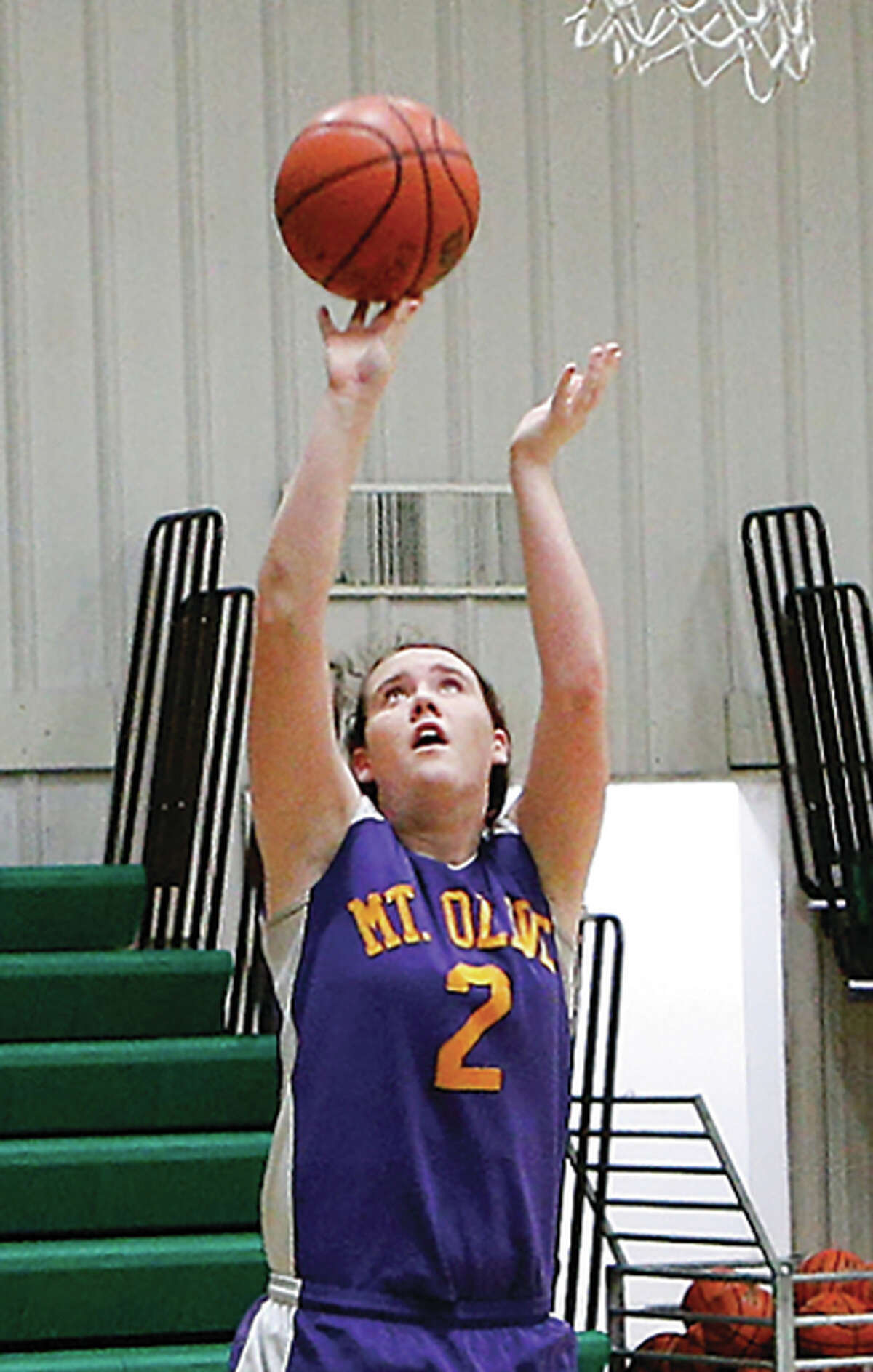 Mount Olive’s Brianna Henke, shown scoring on a layup in a Wildcats win Jan. 4 at Metro East Lutheran in Edwardsville, scored 26 points Wednesday night in a victory over Brussels in Mount Olive.