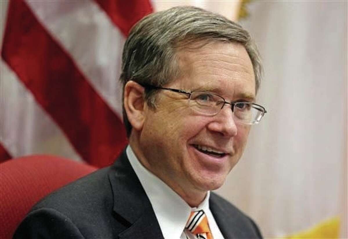 In this file photo, U.S. Sen. Mark Kirk R-Ill., speaks in his office in Chicago. Kirk is making national security a prime focus of his bid for a second term. It’s a strategy that has historically worked well for the GOP, particularly at times when voters are on edge about the country’s safety, as many are now. The winner of the March 15 primary will likely face Kirk, who’s seeking his second term and is considered a heavy favorite to win a GOP primary against businessman James Marter.